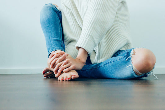 Woman with torn jeans