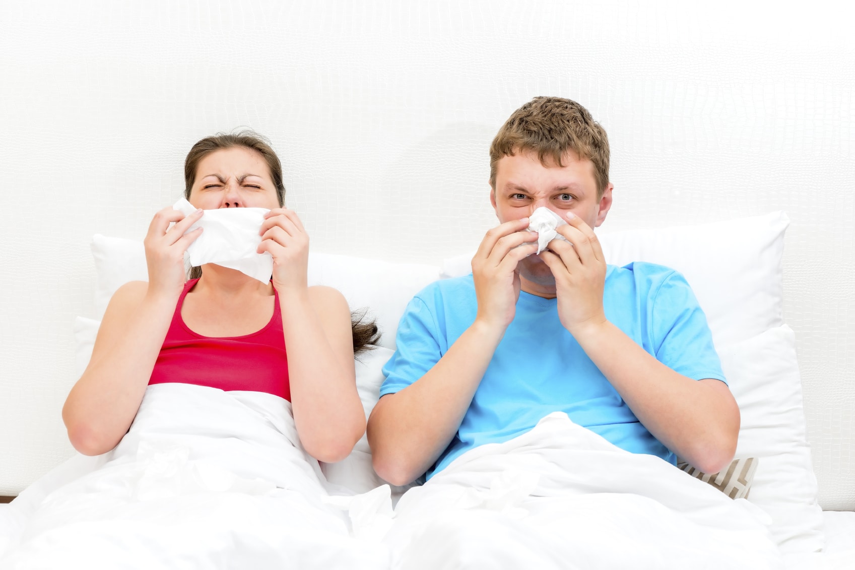 https://www.mattressworldnorthwest.com/wp-content/uploads/2016/05/iStock_000069603757_allergy-sufferer-couple-in-bed.jpg